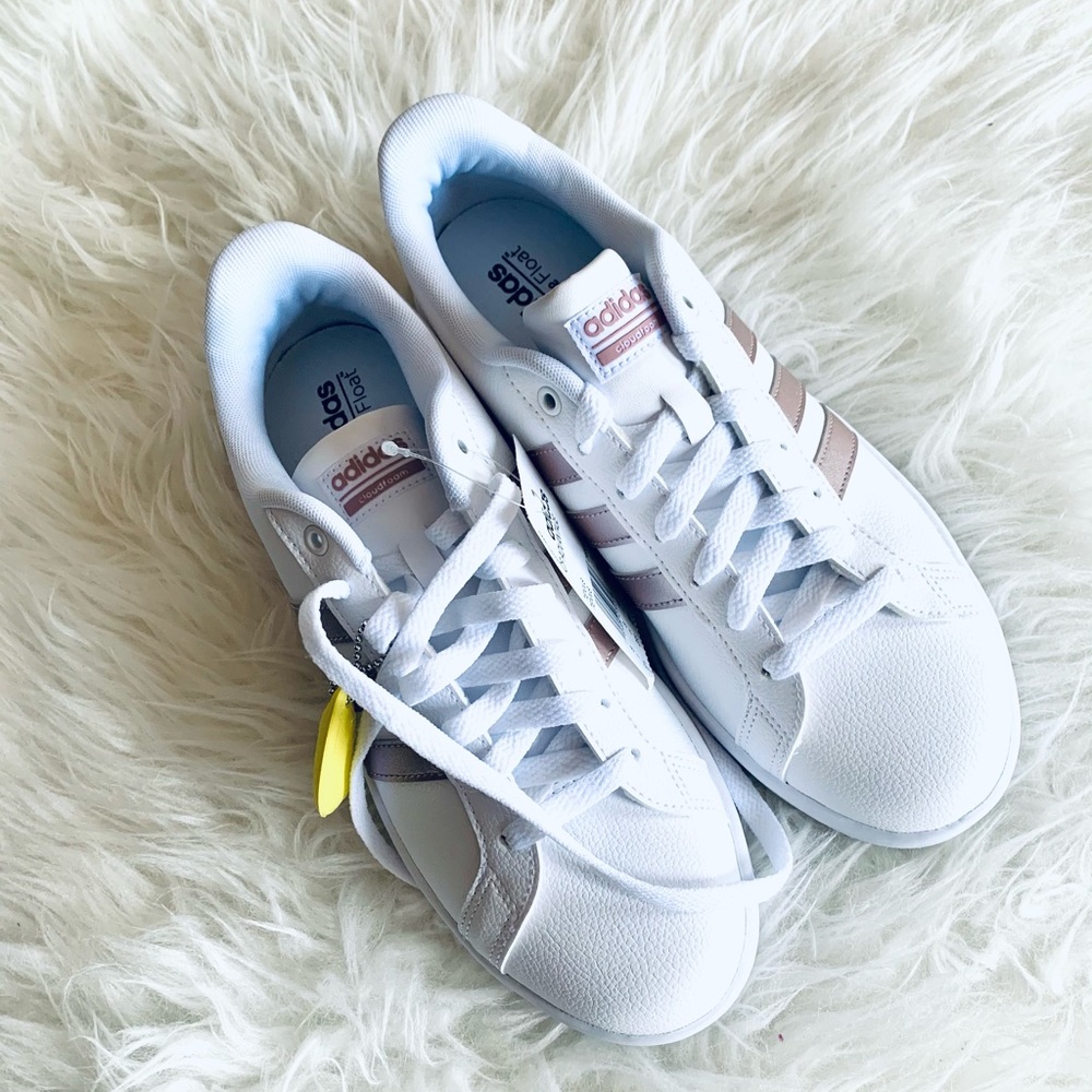 Adidas white & rose gold tennis shoes.
